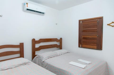 Bed, Photo of the whole room, Bedroom, towels, air conditioner