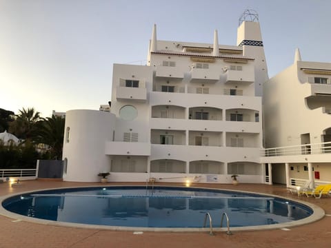 Property building, Swimming pool, Sunset