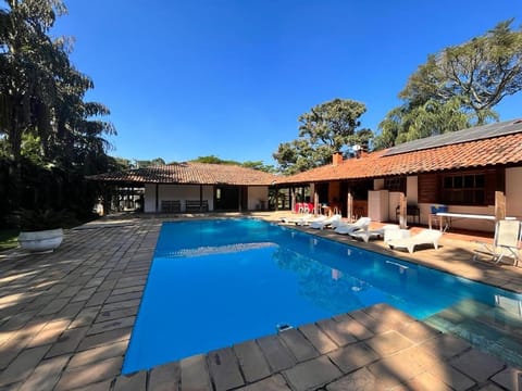 Property building, Patio, Day, Pool view, sunbed