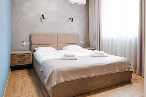 Bedroom, towels, air conditioner