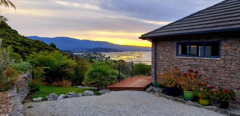 Property building, Facade/entrance, Garden, Mountain view, Sea view, Sunset