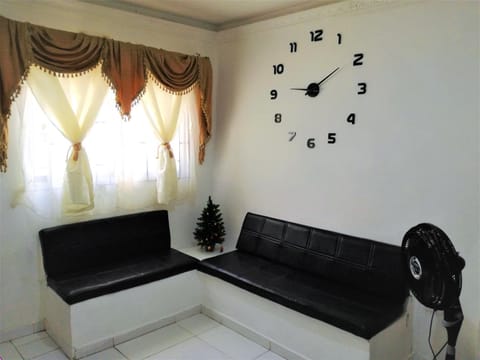 Living room, Lobby or reception, Seating area, fireplace, air conditioner