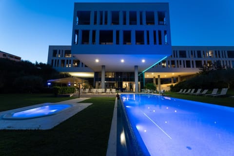 Property building, Night, Pool view, Swimming pool