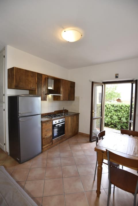 Kitchen or kitchenette, oven, stove, air conditioner