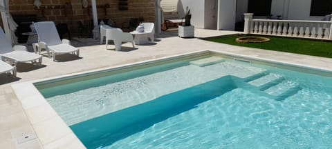 Patio, Pool view, sunbed