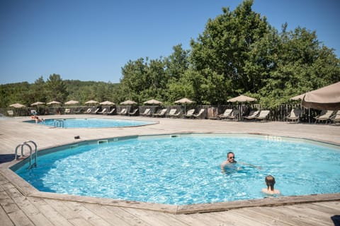 Day, People, Natural landscape, Pool view, Swimming pool, group of guests, sunbed