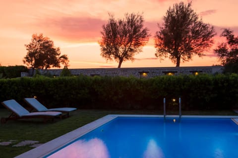 Property building, Swimming pool, Sunset