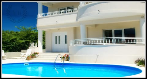 Property building, Patio, Balcony/Terrace, Pool view, Swimming pool, sunbed