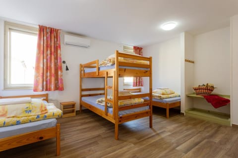 Bed, Photo of the whole room, Bedroom, bunk bed, towels, air conditioner