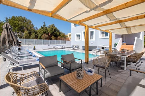 Patio, Day, Seating area, Dining area, Pool view, Swimming pool, sunbed