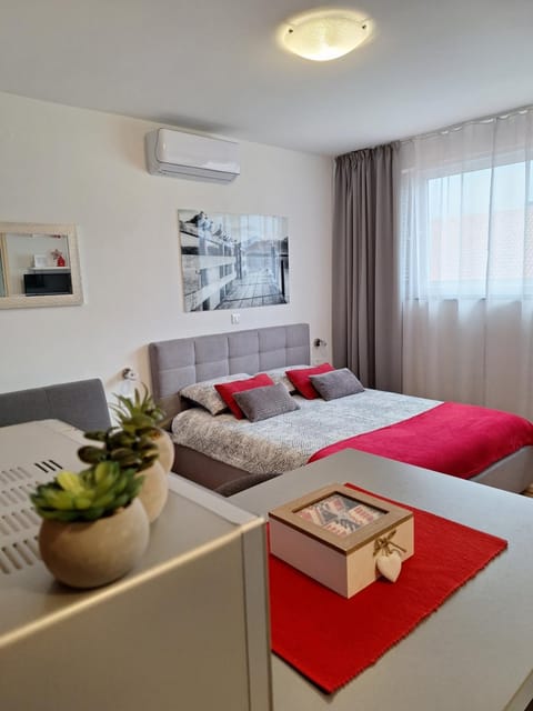 Bed, air conditioner