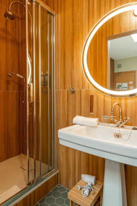 Shower, Toilet, Bathroom, hair dryier, towels