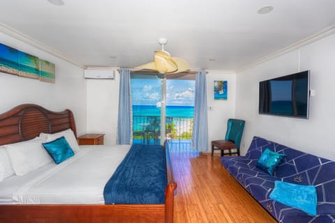 Bed, Seating area, Bedroom, Sea view