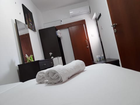 Bed, Photo of the whole room, Bedroom, towels, wardrobe, air conditioner