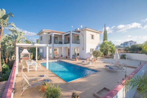 Property building, Garden, Seating area, Swimming pool