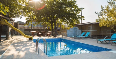 Patio, Pool view, Swimming pool, sunbed