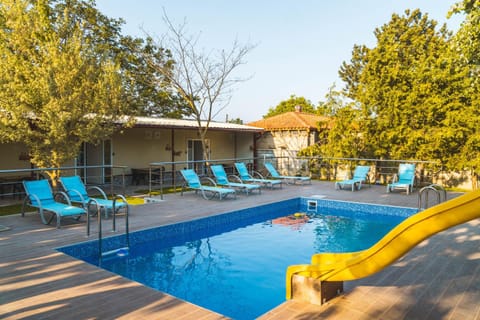 Patio, Day, Pool view, Swimming pool, sunbed