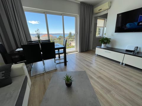 TV and multimedia, Living room, Seating area, Dining area, Sea view