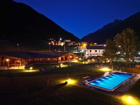 Property building, Night, Natural landscape, Mountain view, Pool view, Swimming pool, sunbed