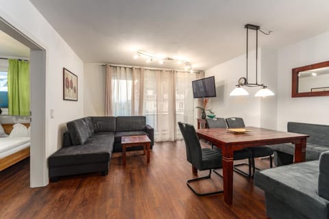 Bed, TV and multimedia, Living room, Photo of the whole room, Seating area, Dining area