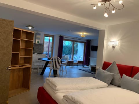 Bed, Living room, Seating area, Dining area, Bedroom