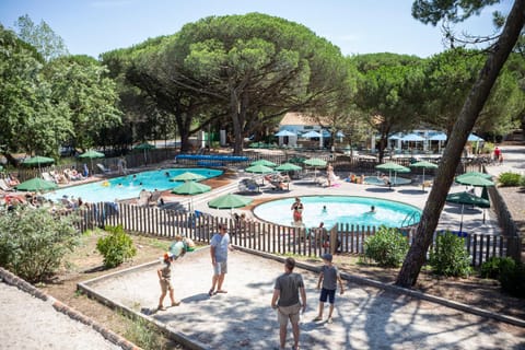 People, Natural landscape, Pool view, Swimming pool, sunbed