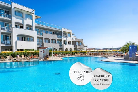 Property building, Day, Pool view, Swimming pool, sunbed