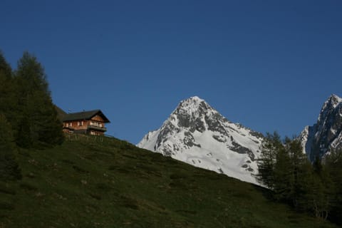 Property building, Natural landscape, Mountain view