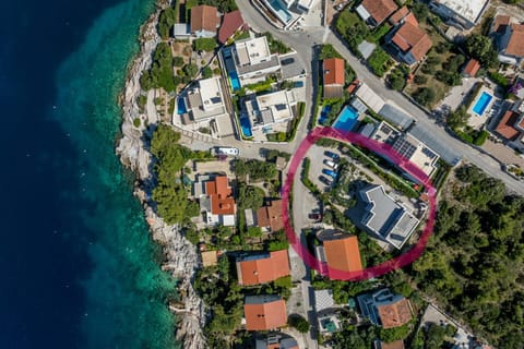 Property building, Day, Neighbourhood, Natural landscape, Bird's eye view, Beach, Sea view, Street view, Location