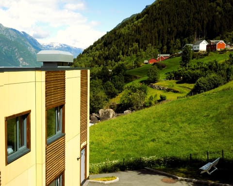 Property building, Nearby landmark, Spring, Day, Natural landscape, Mountain view