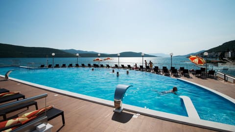Day, Activities, Pool view, Sea view, Swimming pool, sunbed