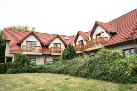 Property building, Patio, Garden, Balcony/Terrace, group of guests