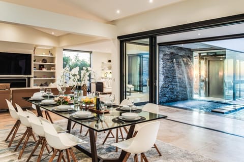 Living room, Seating area, Dining area, Pool view, Swimming pool