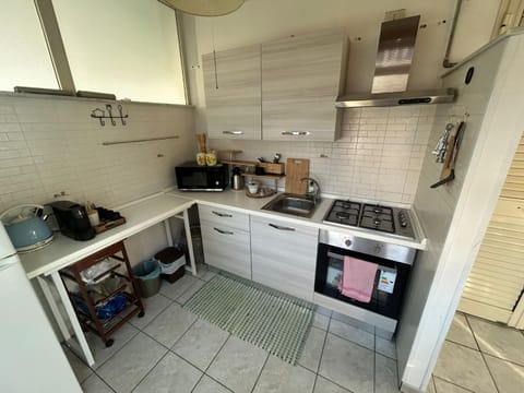 Kitchen or kitchenette, oven, stove