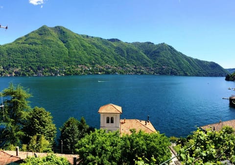 Property building, Natural landscape, Lake view, Mountain view