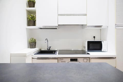 Kitchen or kitchenette, stove