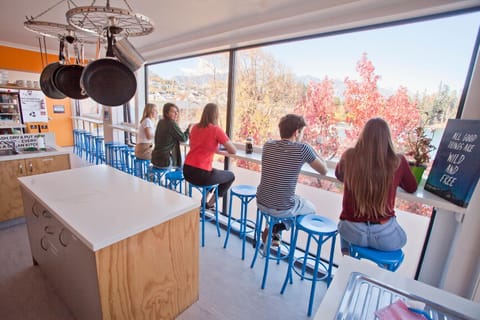 People, View (from property/room), Kitchen or kitchenette, Seating area, Dining area, Communal kitchen, Autumn, Guests, City view, Garden view, Lake view, Landmark view, Mountain view, Street view, Seasons, group of guests, kitchen