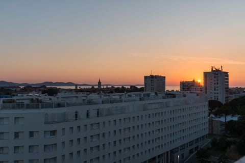 Property building, Bird's eye view, City view, Sea view, Sunset