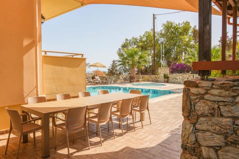 Patio, Day, Dining area, Pool view, Swimming pool