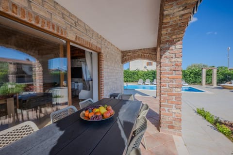 Patio, Day, View (from property/room), Balcony/Terrace, Seating area, Dining area, Pool view, Swimming pool