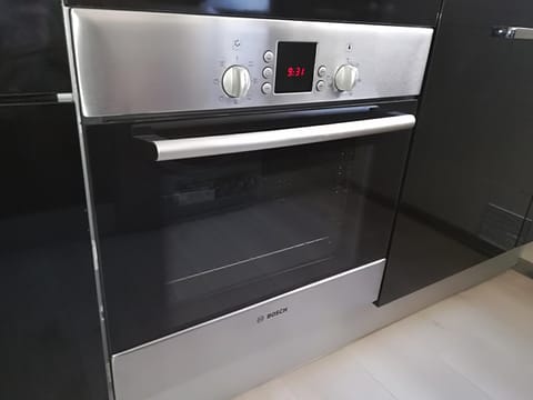 Kitchen or kitchenette, oven