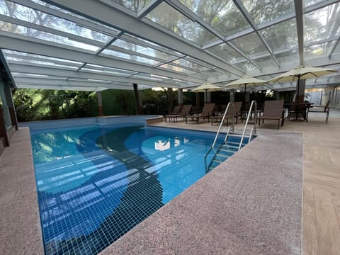 Swimming pool, sunbed