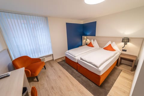 Bed, Seating area, Bedroom