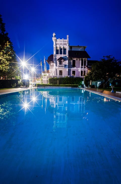 Property building, Night, Swimming pool, Swimming pool