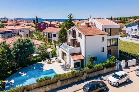 Villa Andrija Family Dream with heated pool at the sea with beautiful garden, outside cinema and kids playground Villa in Fažana