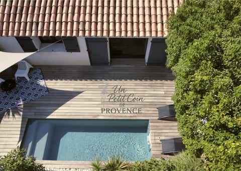 Property building, Day, Text overlay, Pool view, Swimming pool