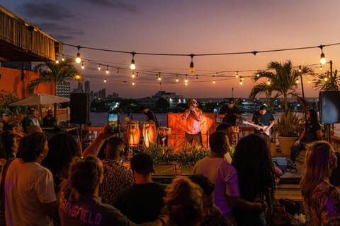 People, Balcony/Terrace, Entertainment, Sunset, group of guests