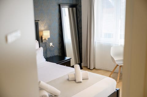 Bed, Seating area, Bedroom