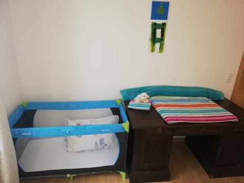 Photo of the whole room, Bedroom, cot