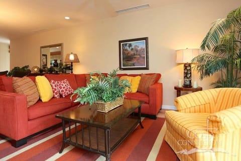 Luxe! Impressively designed 2nd-floor unit in Coco done in red and orange hues Maison in Coco